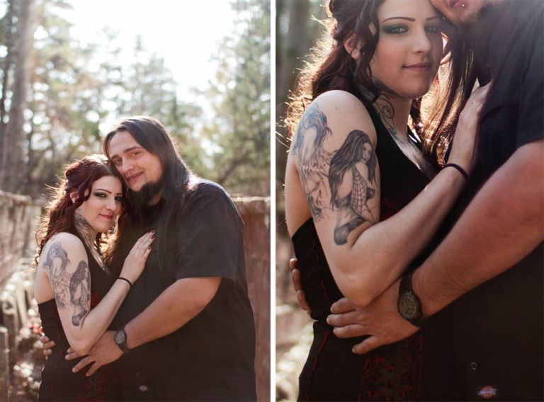 tattooed couple poses for engagement photos for markow photography at an abandoned site