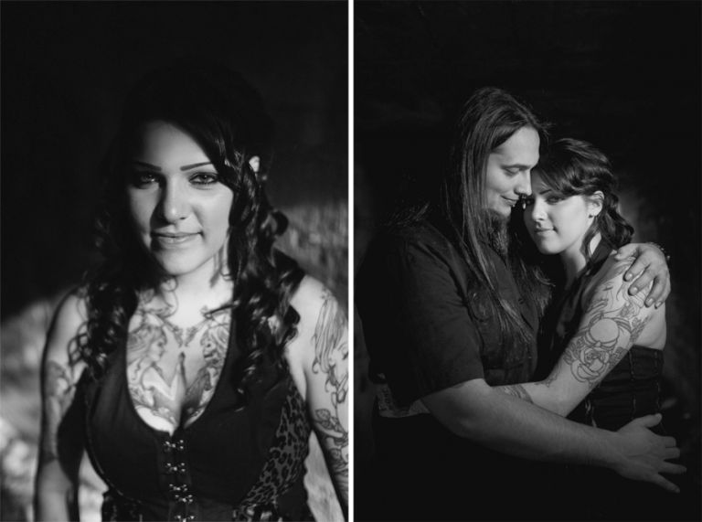 tattooed couple embraces for engagement photos for markow photography at an abandoned site