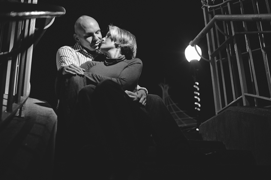 Couple poses on staircase during their engagement photo session with their monmouth county nj wedding photographers markow photography