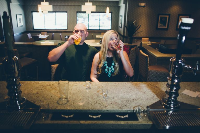 couple in a bar during engagement session with monmouth county wedding photographers