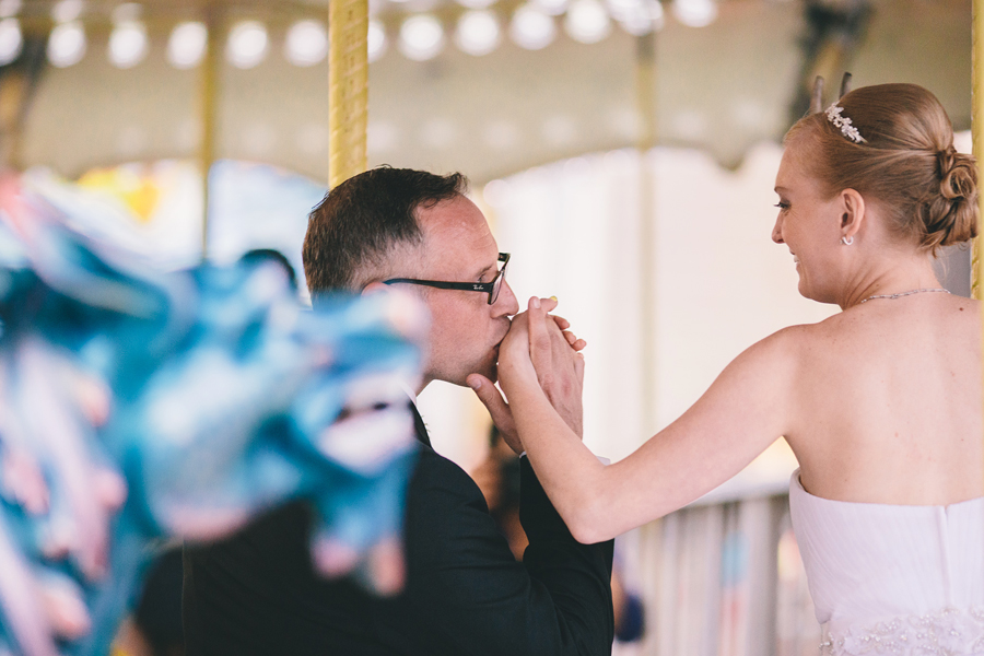 Photo of Bride and Groom on Carousel in Ocean City, NJ
