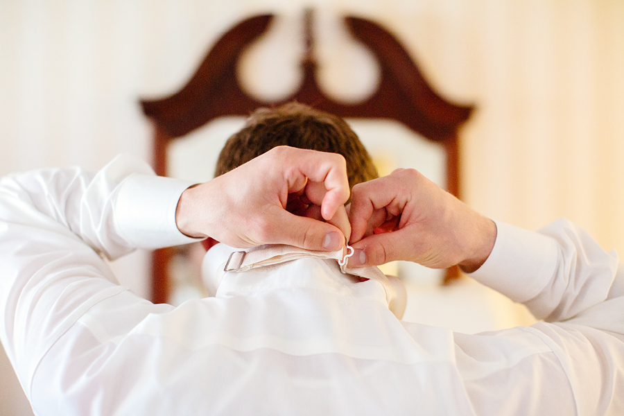 groom getting ready at madison hotel in morristown, nj
